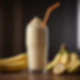 Freshly blended banana milkshake in a glass with a straw
