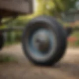 Detailed view of a one-inch axle garden cart wheel showcasing its robust design and materials