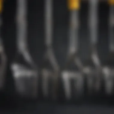 Comparison of different types of hook-on bucket forks in a workshop.