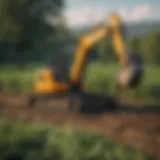 Mini excavator in a lush agricultural field